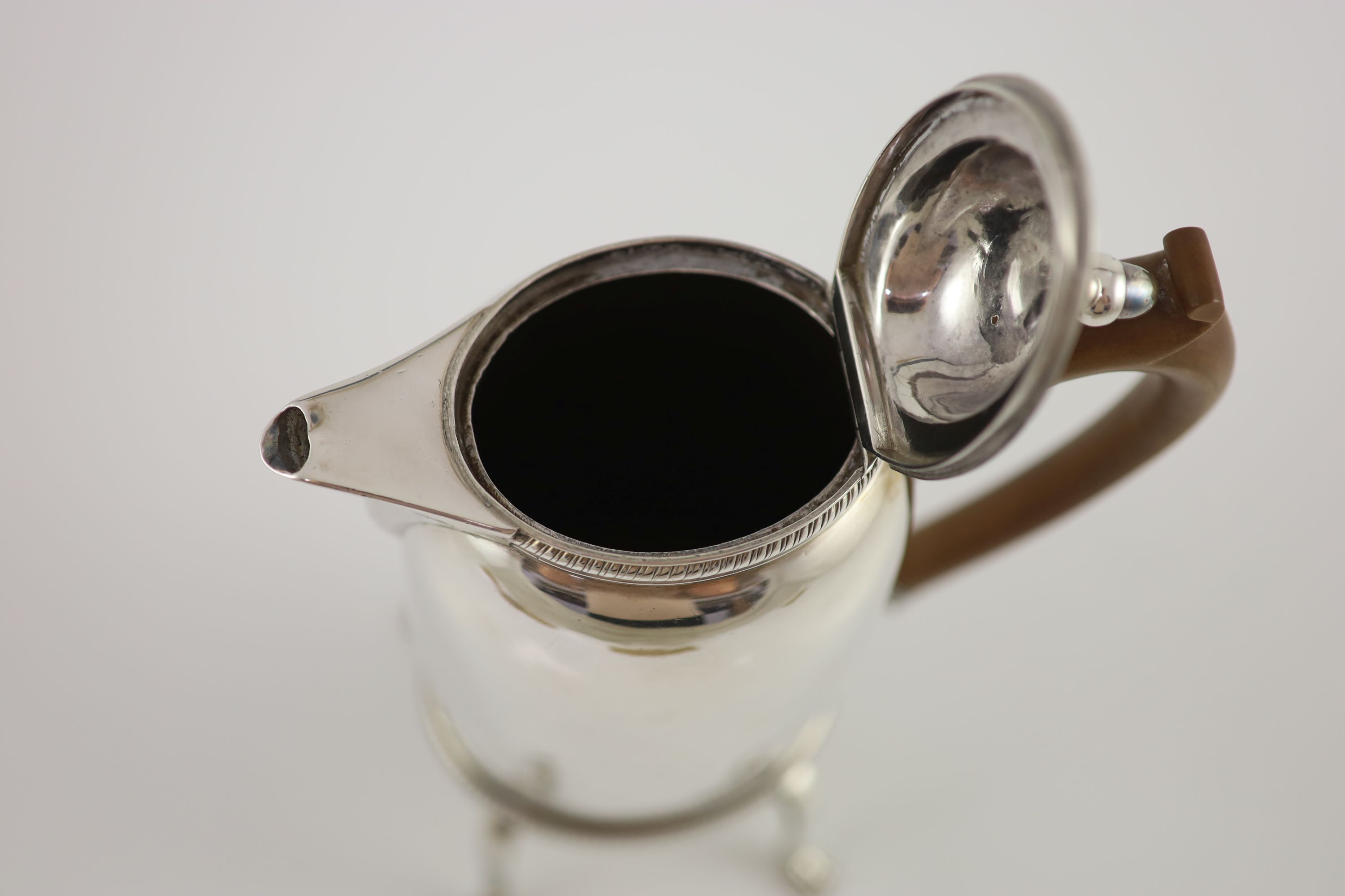A George III silver oval biggin pot, John Edwards III, London, 1799, on stand with burner, John Edwards III, London, 1803